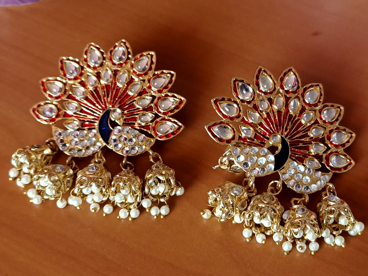 AD And Kundan Studded Peacock Earrings